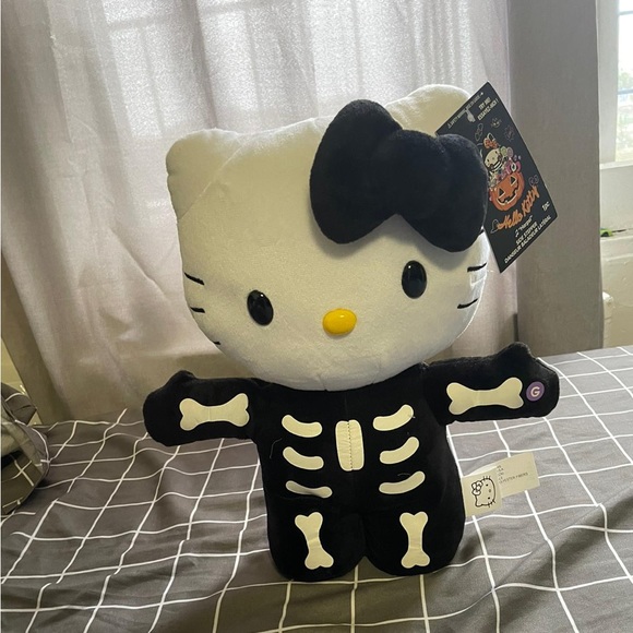 COPY - Hello Kitty Skeleton Side Stepper Plays “Harpsi” Halloween - Picture 1 of 4